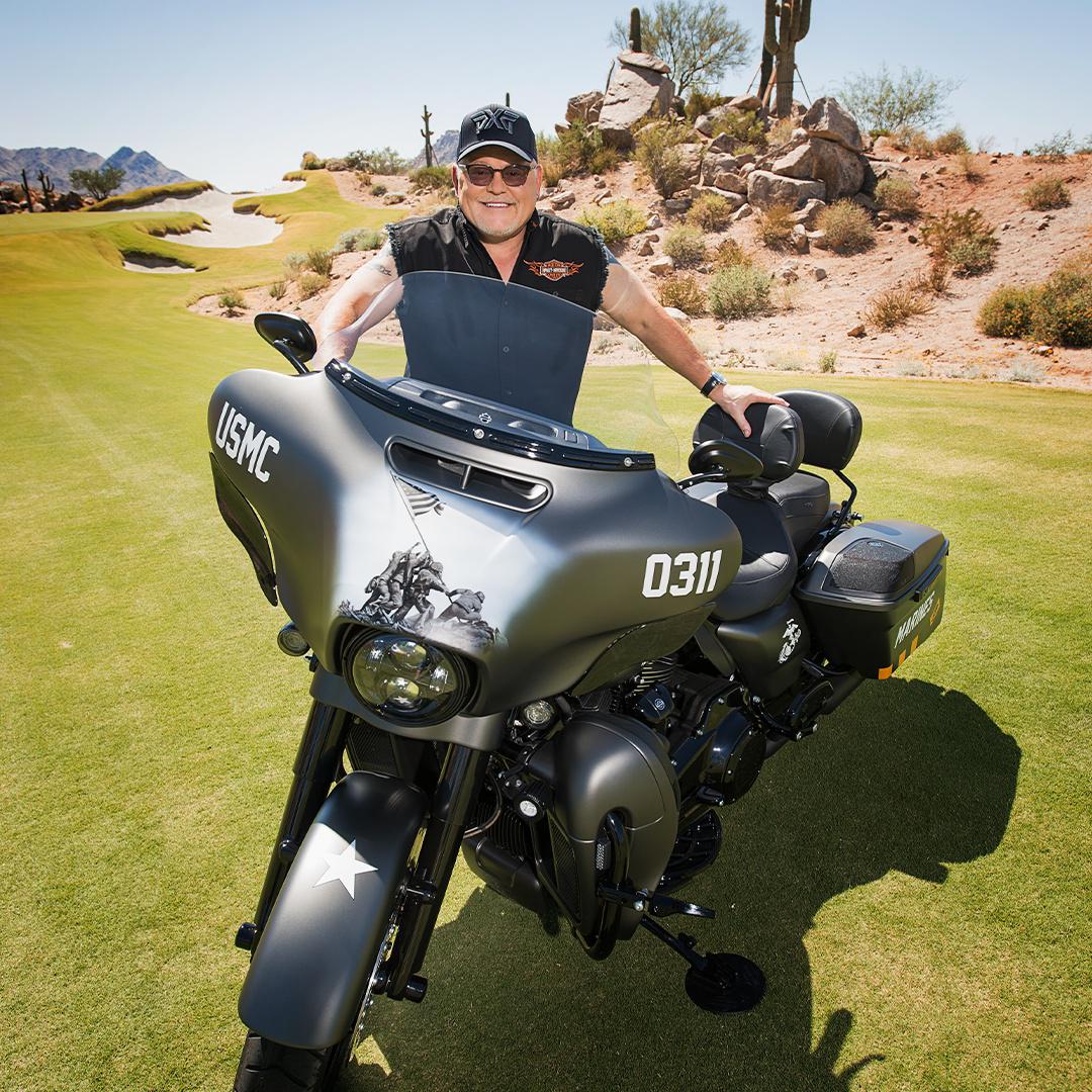 Photo of Bob Parsons with motorcycle